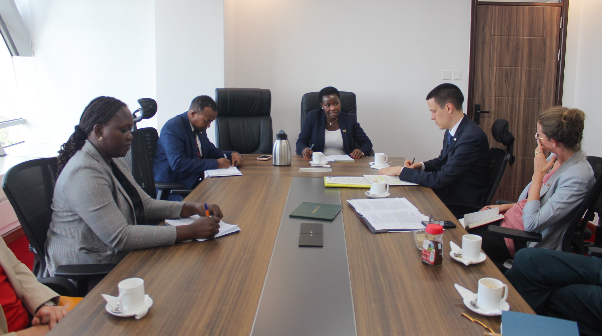 Principal Secretary Hon. Susan Mangéni, CBS alongside delegation from the Federal Republic of Germany led by Yannic Kiewitt