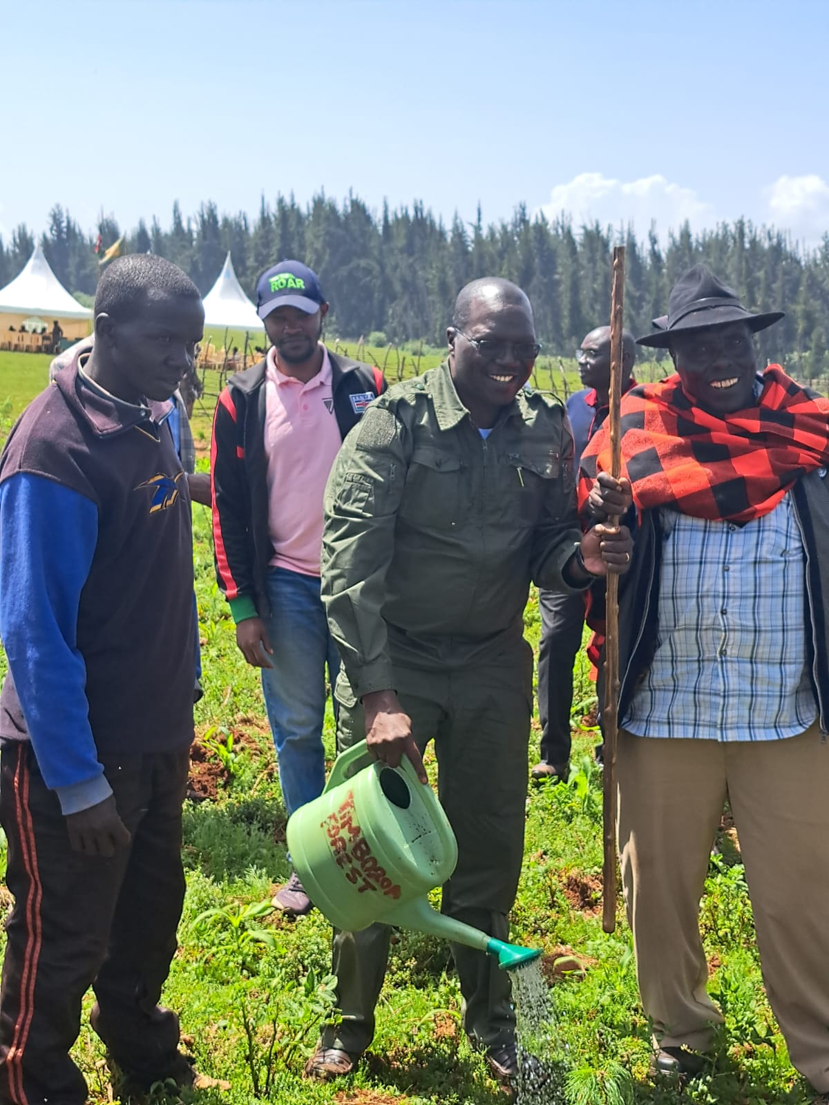 CS Ministry of Co-operatives & MSME, Hon. Simon Chelugui watering a tree at Timboroa Forest