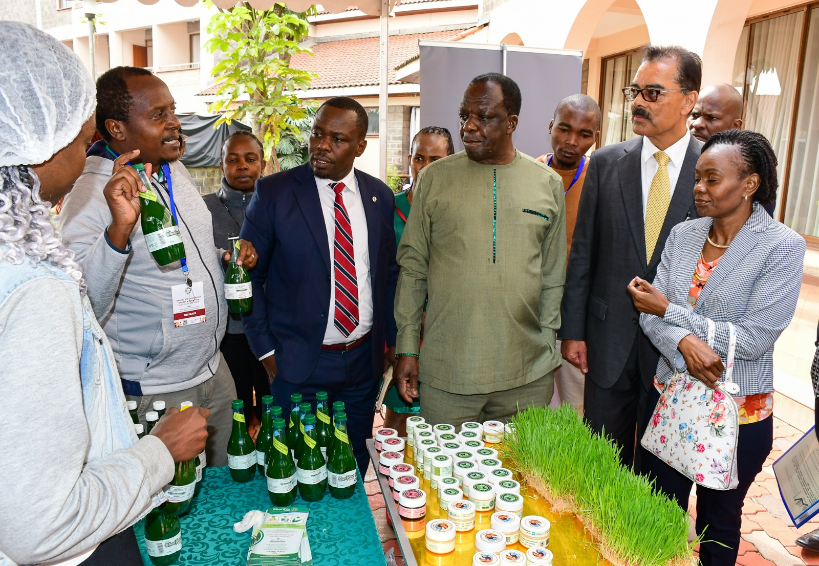 Hon. Oparanya visiting stands at the SME Confrence, Awards and Exhibitions alongside other delegates