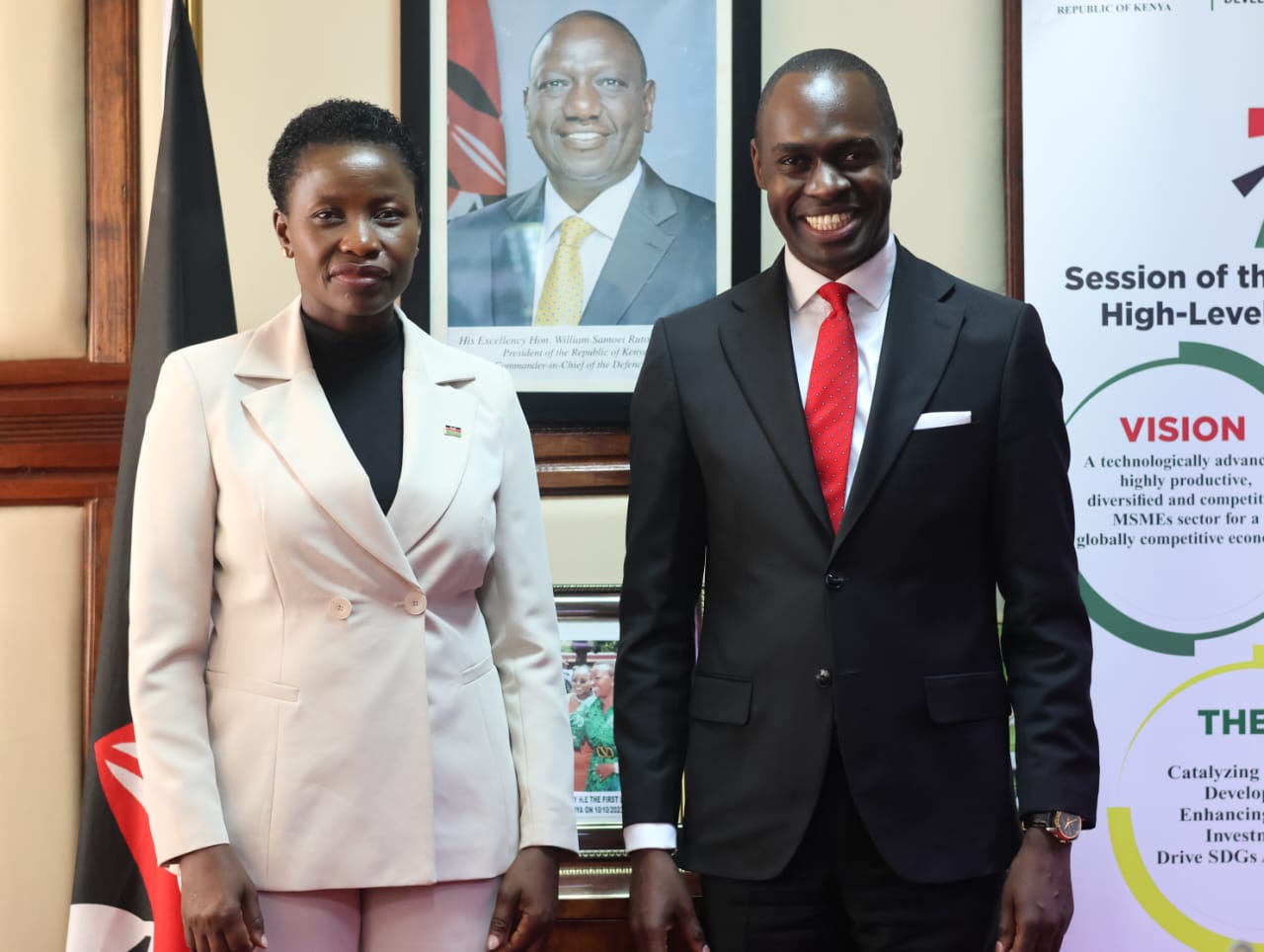 Principal Secretary MSMEs Development poses alongside Co-operative University of Kenya (CUK) Chancellor, Dr. Benard Chitunga