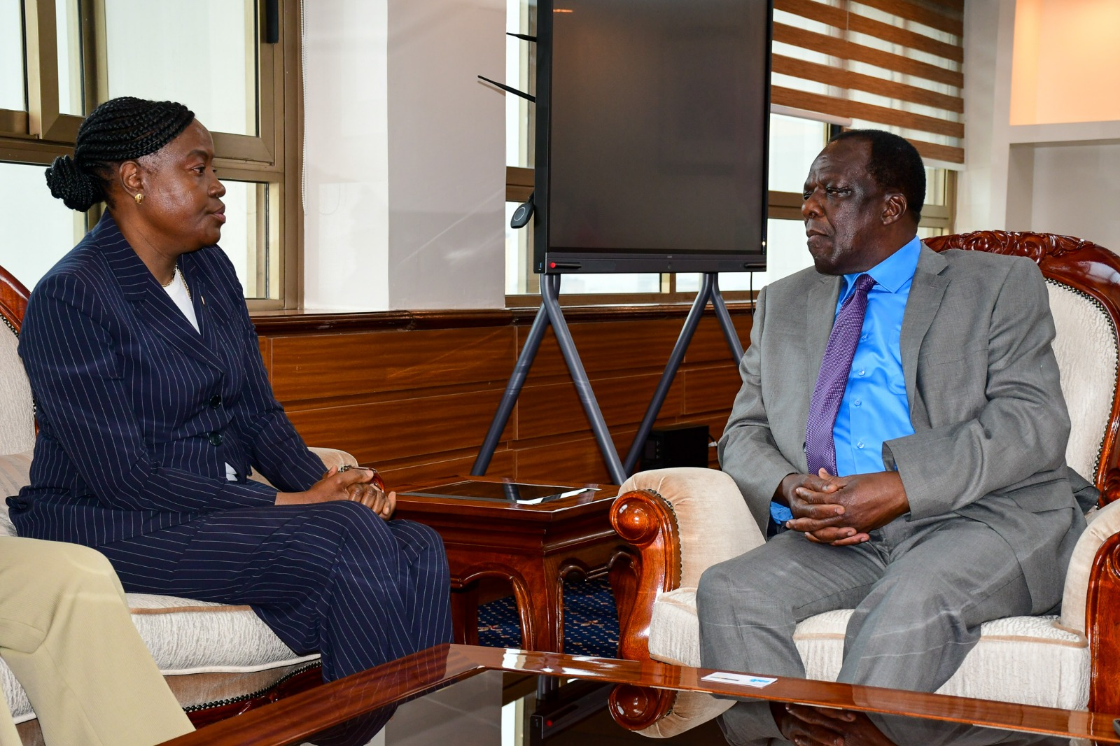 CS. Co-operatives and MSMEs Development Hon. Wyclifee Oparanya and Director of the East African Development Bank (EADB)
