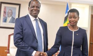 Newly appointed CS. Hon Wyclifee Oparanya handshakes PS. MSME Development Hon. Susan Mang'eni