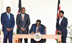 CS. Ministry of Co-operatives and MSMEs Development signs PC alongside PS. Hon. Patrick Kilemi, Hon. Susan Mang'eni and Performance and Delivery Management Deputy Chief of Staff Hon. Eluid Owalo