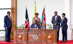 His Excellency Dr. William Samoei Ruto signs the Performance Contract for the Ministry of Co-operatives and MSMEs Development, alongside the ministerial leadership