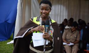 Hon. Mang'eni delivers a speech at the Launch of Issuance of Uwezo Fund cheques at Kapsabet