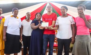 Mohamed Ali poses for a photo among Nyali beneficiaries